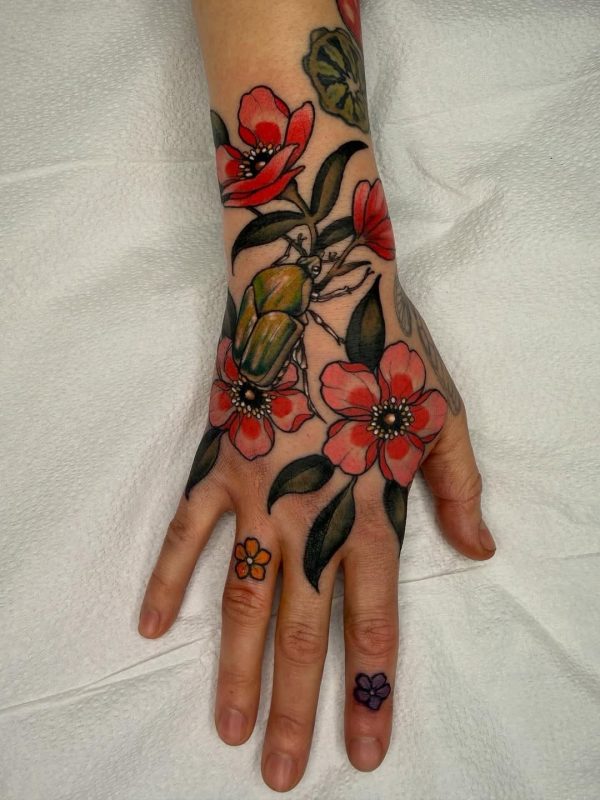 Floral beetle hand