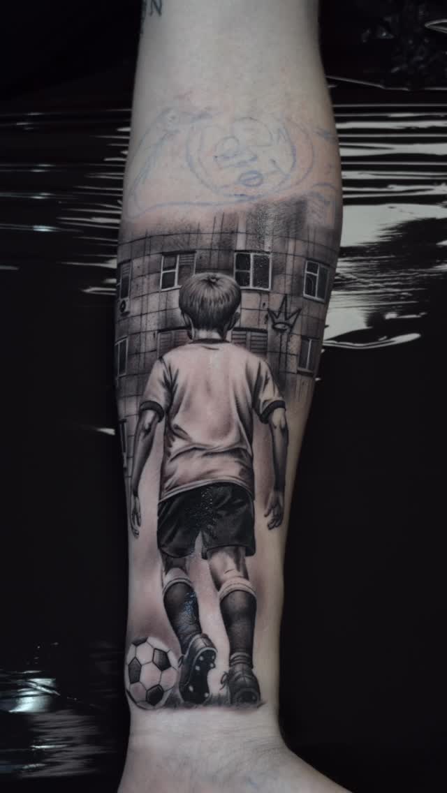 Boy with Soccer Ball