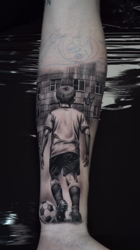 Boy with Soccer Ball
