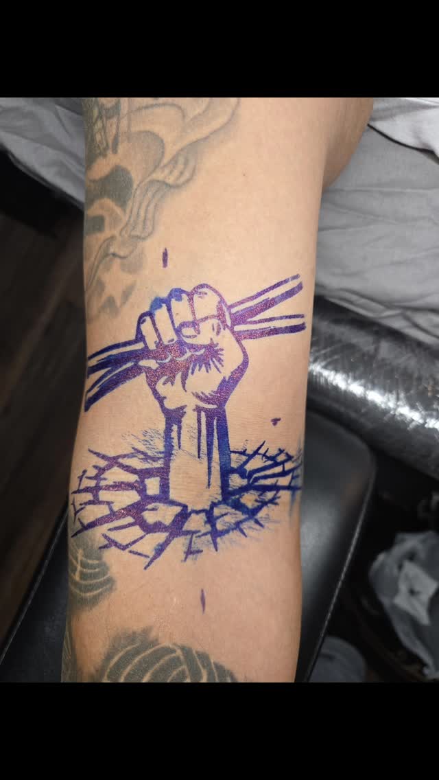 Fist Breaking Ground