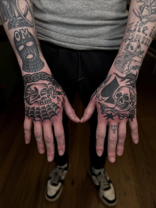 Skull Hand Tattoos