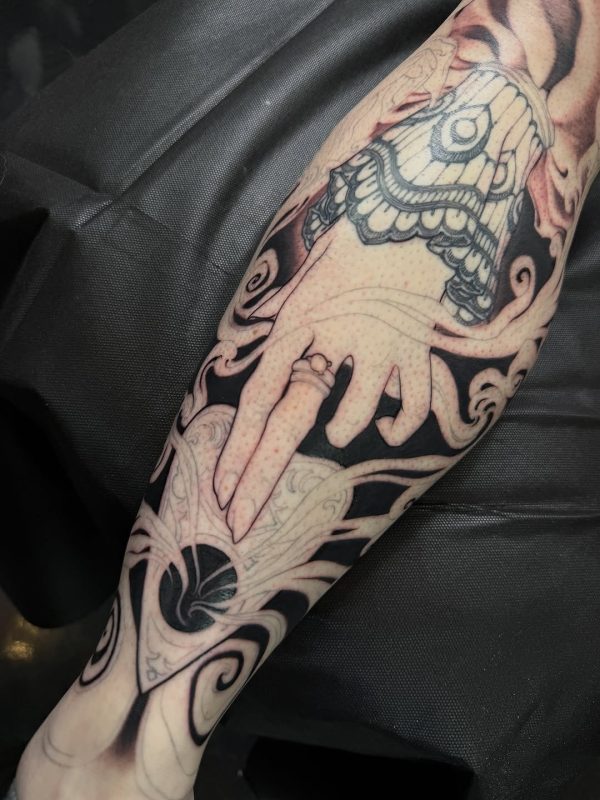Hand and Swirls